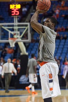 C.J. Fair fires a shot during pregame warm-ups. 