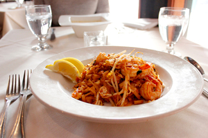 Lemon Grass's pad thai includes rice noodles mixed with bean sprouts, chives, egg, tofu and ground peanuts, held together by a nutty yet tangy tamarind sauce.