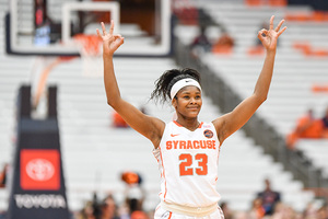 Isis Young celebrates after hitting a three.