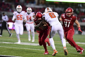 Louisville's quarterback, Micale Cunningham, threw for a career-high five touchdowns against the Orange on Saturday.