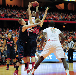 Syracuse forward C.J. Fair attempts a jump shot. 