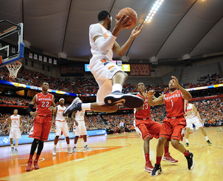 James Southerland keeps the ball from going out of bounds.