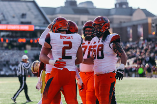 Dungey celebrates with teammates after the play.